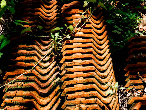rooftile in java culture is made of clay that is shaped in such a way that it can be stacked