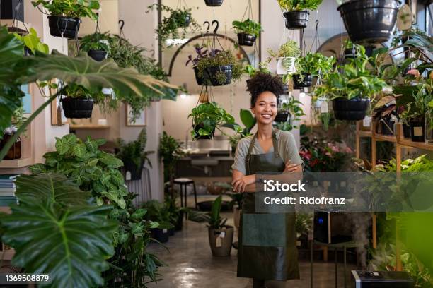 Woman Working In Plant Flower Shop Stock Photo - Download Image Now - Small Business, Owner, Business
