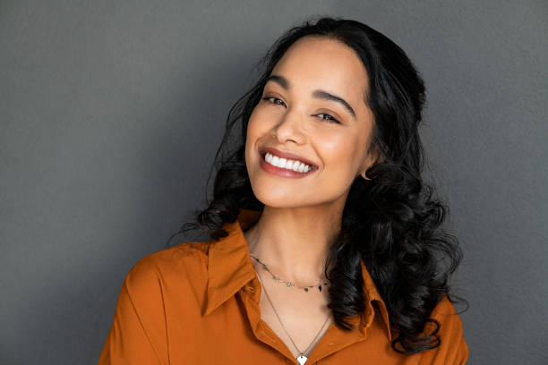 istock Happy latin beautiful woman smiling 1369508880