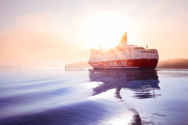 Turku, Finland - August 10, 2019: Passenger ferry in archipelago at Turku, Finland. It's coming from Stockholm, Sweden on a foggy, sunny morning.