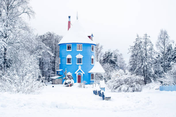 Naantali, Finland - January 17, 2010: A scenic shot of human-size Moominhouse in Moomin World theme park during snowy winter day, Naantali, Finland. It is a magical place for children of all ages.