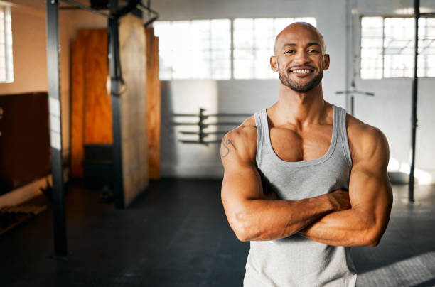 istock Shot of a young man taking a break during his workout routine 1369509398