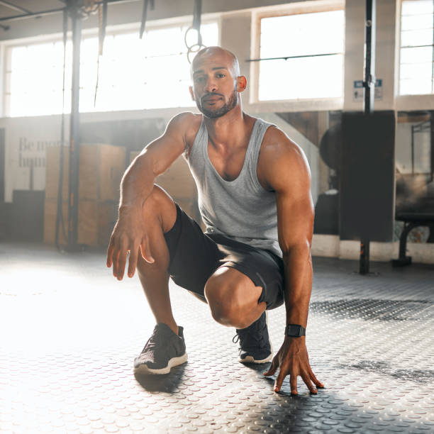 istock Shot of a young man taking a break during his workout routine 1369509402