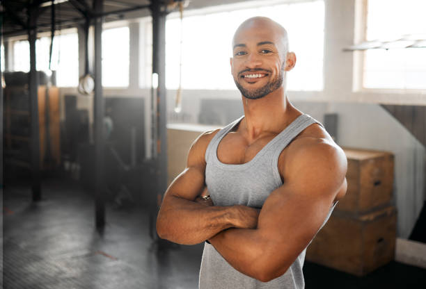 istock Shot of a young man taking a break during his workout routine 1369509403