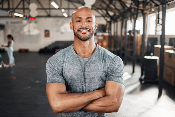 istock Shot of a young man taking a break during a workout 1369509421