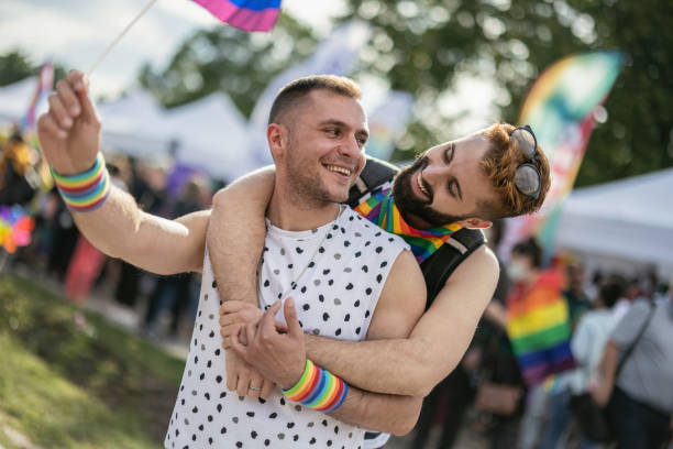 istock Men at the LGBTQ pride parade 1369510476