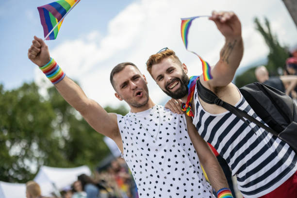 istock Men at the LGBTQ pride parade 1369510487