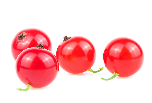 istock Group of red currant berries isolated on a white background. Fresh ripe berries. 1369510631