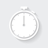 White icon of "Stopwatch" in a flat design style isolated on a gray background and with a long shadow effect. Vector Illustration (EPS10, well layered and grouped). Easy to edit, manipulate, resize or colorize. Vector and Jpeg file of different sizes.