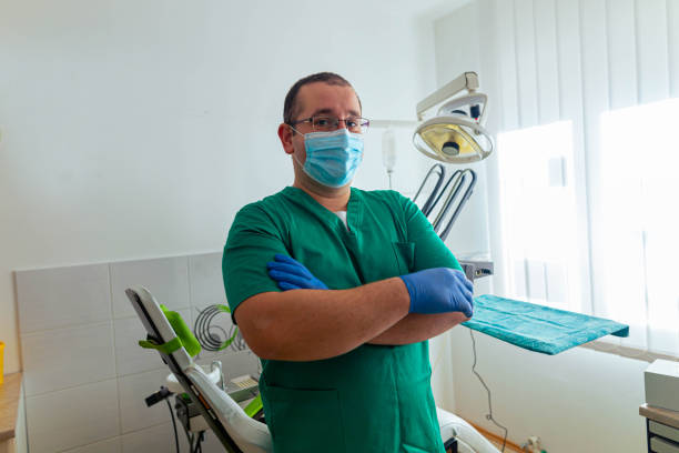 istock Male dentist portrait 1369514900