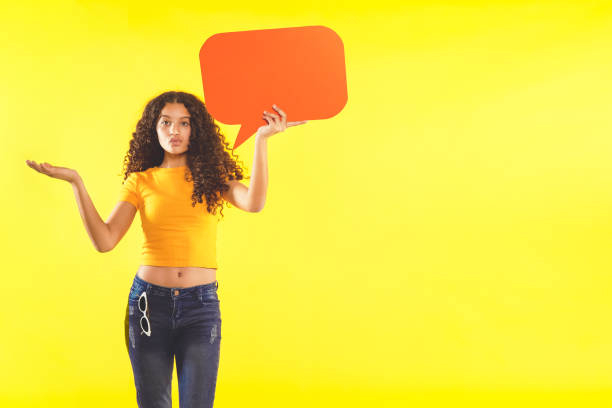 istock Teenager holding a sign 1369515665