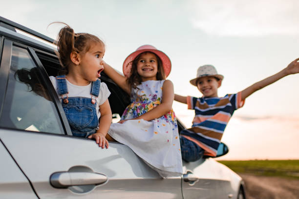 istock Beautiful children enjoying on a road trip 1369517867