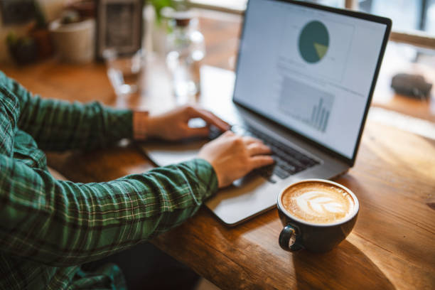 istock Working at the morning with a cup of coffee. 1369519311
