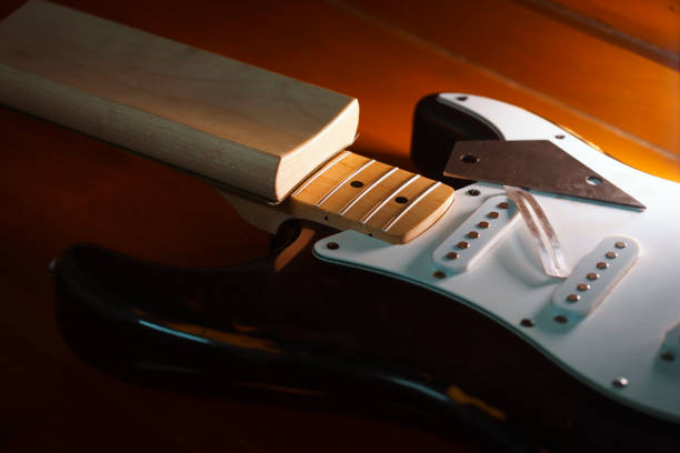istock black electric guitar maintenance fret leveling 1369522871