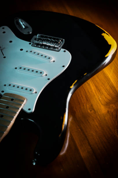 istock black electric guitar maintenance fret leveling 1369522874