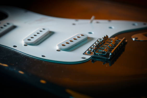 istock black electric guitar maintenance fret leveling 1369522894