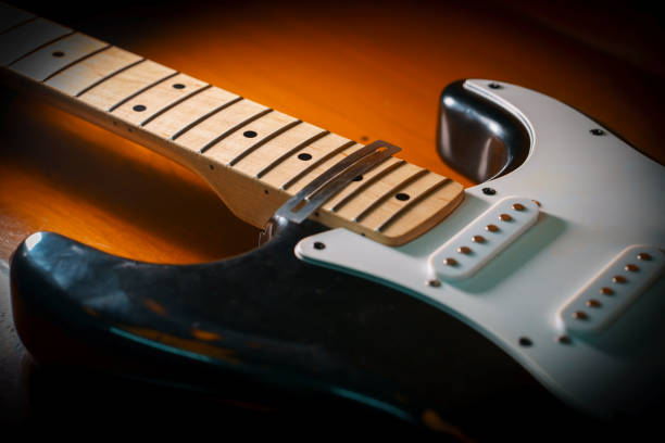 istock black electric guitar maintenance fret leveling 1369522913