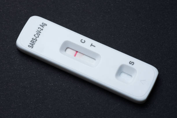 istock Negative Sars-Cov-2 antigen rapid test on black background 1369523474