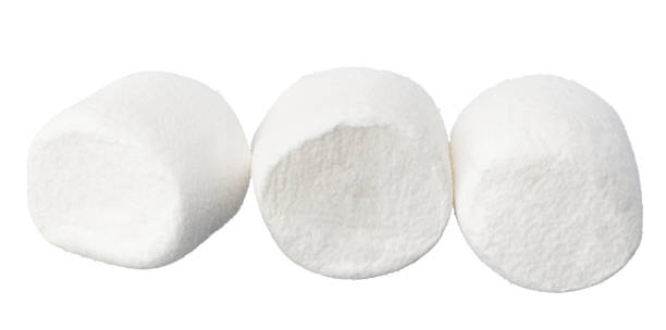 istock Heap of delicious marshmallows isolated on white background 1369523560