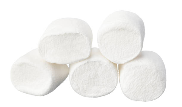 istock Heap of delicious marshmallows isolated on white background 1369523731