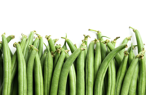 Pile of green beans as background. Top view