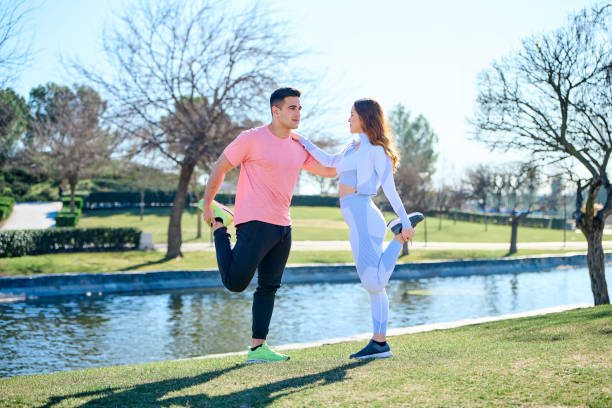 istock Young couple practicing sports outdoors 1369527249