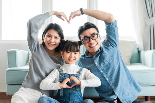 small asian family portrait at home small asian family portrait at home filipino family stock pictures, royalty-free photos & images