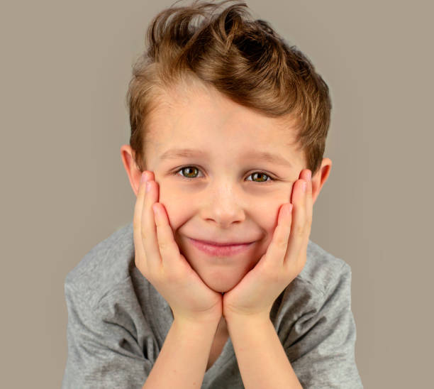 istock Portrait of a cheerful boy 1369528266