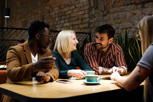 istock Four colleagues are sitting and talking. Start-up. 1369529729