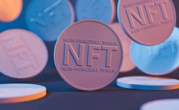 close-up of messy NFT coins with neon lighting stock photo