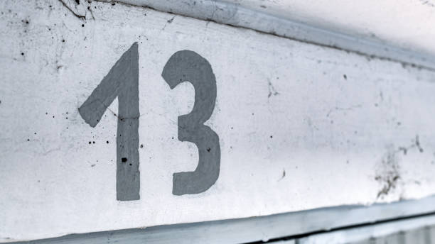 istock Number thirteen above car garage door 1369531853