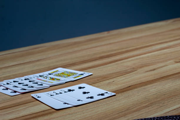 istock Playing cards, wodden tabble.
A little fun at home. 1369532136
