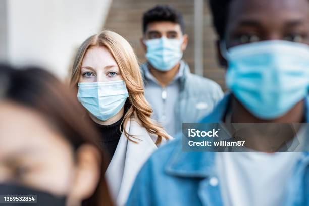 Multiracial People In The City Wearing Face Mask Stock Photo - Download Image Now - Protective Face Mask, Pandemic - Illness, People