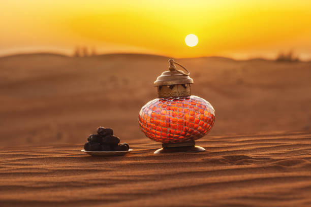 istock Lantern and dates in the desert at a beautiful sunset, symbolizing Ramadan 1369533718