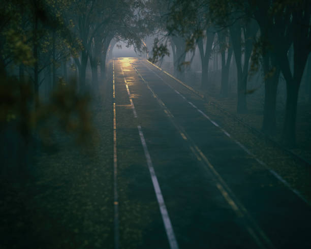 istock Empty misty road in an autumn forest leading to a tunnel. High angle view. 3D render. 1369534941