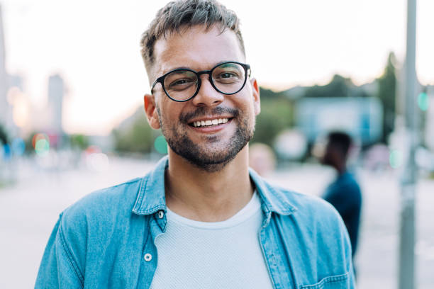 istock Modern young man in the city. 1369536932