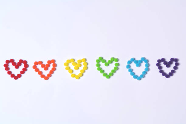 Hearts of rainbow color from fluffy circles. Background for holiday valentine's day. LGBT concept. Movement for equal rights
