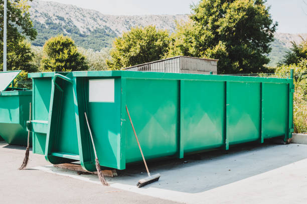 Large waste container at local sorting station Large green garbage container at local waste sorting station. industrial garbage bin stock pictures, royalty-free photos & images