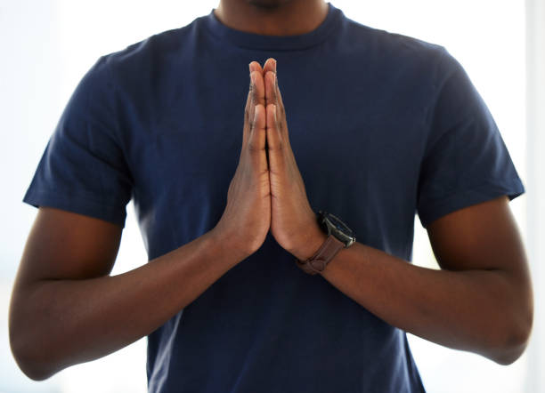 istock Studio shot of an unrecognisable man praying 1369543299