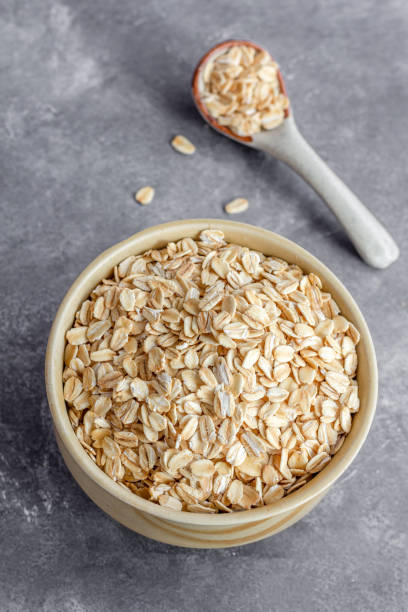 Oat Flake, Oatmeal in a Bowl Vertical Photo