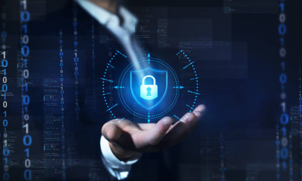 istock Businessman holding  padlock in hand on binary background. Global networking connection background. Network security and data protection. 1369546631