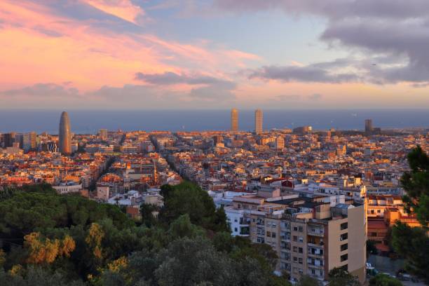 Barcelona cityscape with Mediterranean Sea in background. Sunset city view of Barcelona, Spain.