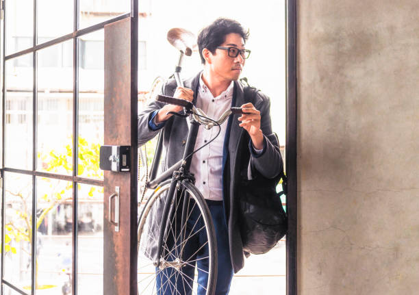 A cycle commuter arriving at the office for work.