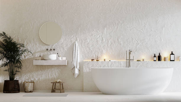istock Modern bathroom interior mock up with bathtub, sink and mirror, towels and bath accessories, 3d rendering 1369553382