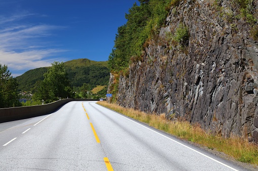 Roads in Norway. Road curve in Naustdal, Sogn og Fjordane county.