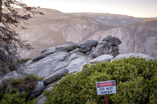 Danger do not enter signal at Yosemite national park at Glacier point with its famous overhanging rock. California, USA