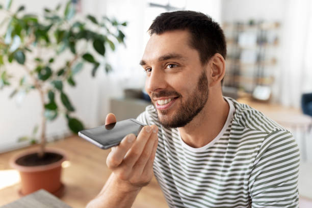 istock man calling or recording voice with phone at home 1369557882
