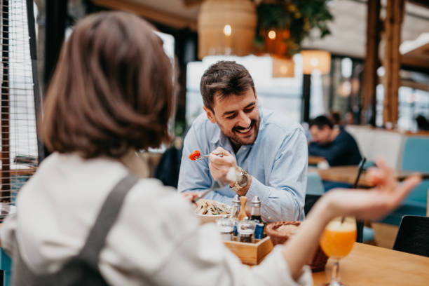 istock Friends catching up over lunch 1369559497