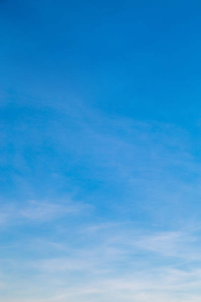 istock Vertical image white clouds in blue sky in the morning. 1369560778