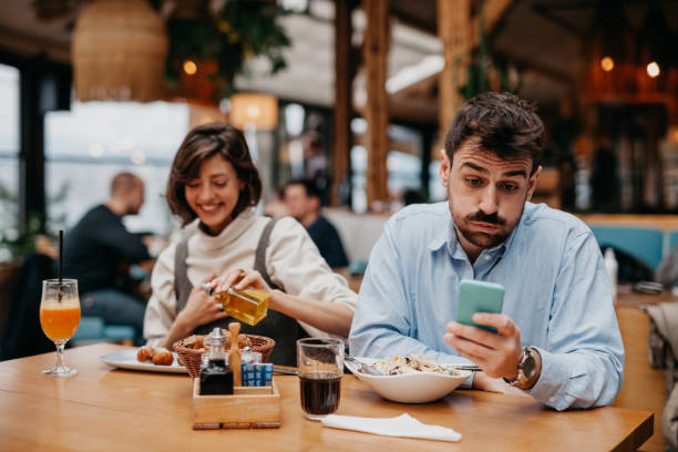 istock Stop using a phone while having lunch, enjoy in the moment 1369561600